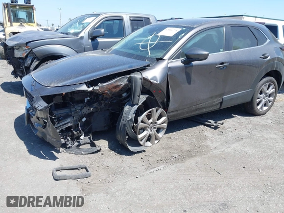 2021 Mazda CX-30 Select z VIN 3MVDMABL3MM233701, wystawiony jako IAAI lot #42086778 z przebiegiem Nie podano mil oraz . Historia ofert i sprzedaży dostępna na DreamBid. Obrazek 2.