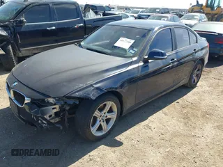 2015 BMW 3 Series 320i with VIN WBA3B1C53FK138310, listed as a IAAI auction lot 41677208 with 57,891 mi miles. Bid and sale history available at carsss.com. Image 17.