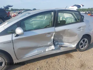 2015 Toyota Prius Four z VIN JTDKN3DU9F1888663, wystawiony jako IAAI lot #42150877 z przebiegiem 138 414 mil mil oraz . Historia ofert i sprzedaży dostępna na DreamBid. Obrazek 6.