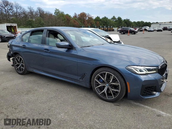 2023 BMW 5 Series M550i xDrive with VIN WBA13BK06PCM31937, listed as a Copart auction lot 66490494 with 24,972 mi miles and Salvage title. Bid and sale history available at DreamBid. Image 4.