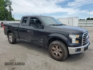 2015 Ford F-150 XLT with VIN 1FTEX1EP6FFC26434, listed as a Copart auction lot 57378705 with 129,295 mi miles and Salvage title. Bid and sale history available at DreamBid. Image 4.