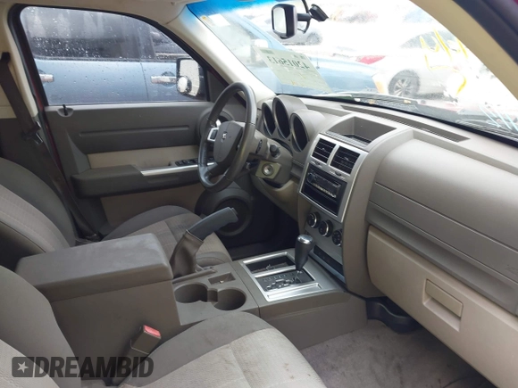 2007 Dodge Nitro SLT with VIN 1D8GT58K77W640112, listed as a IAAI auction lot 42015613 with 220,061 mi miles. Bid and sale history available at carsss.com. Image 5.