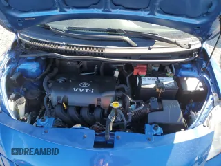 2009 Toyota Yaris with VIN JTDBT903891323833, listed as a Copart auction lot 47460975 with 134,524 mi miles and Salvage Title. Bid and sale history available at DreamBid. Image 11.