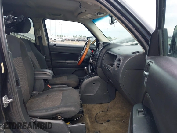 2014 Jeep Patriot Latitude with VIN 1C4NJPFA2ED564275, listed as a IAAI auction lot 42371032 with 221,965 mi miles and . Bid and sale history available at DreamBid. Image 5.