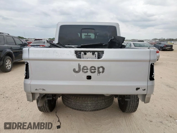 2022 Jeep Gladiator High Altitude with VIN 1C6HJTFGXNL163998, listed as a Copart auction lot 56490755 with 52,474 mi miles and Salvage title. Bid and sale history available at DreamBid. Image 6.