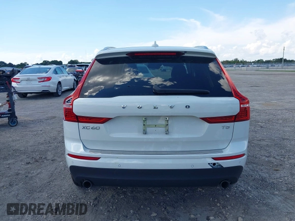 2021 Volvo XC60 Momentum with VIN YV4102DK6M1826828, listed as a IAAI auction lot 40603154 with 58,124 mi miles and . Bid and sale history available at DreamBid. Image 16.