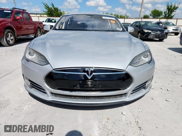 2013 Tesla Model S with VIN 5YJSA1CG5DFP03704, listed as a Copart auction lot 65143565 with Not provided miles and Clean title. Bid and sale history available at DreamBid. Image 5.
