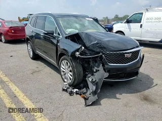 2023 Cadillac XT6 AWD Premium Luxury z VIN 1GYKPFRS7PZ225950, wystawiony jako Copart lot #65573174 z przebiegiem Nie podano mil oraz Szkoda całkowita • Salvage title. Historia ofert i sprzedaży dostępna na DreamBid. Obrazek 12.