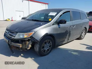 2012 Honda Odyssey EX-L with VIN 5FNRL5H69CB128585, listed as a IAAI auction lot 41695109 with 231,565 mi miles and . Bid and sale history available at carsss.com. Image 17.