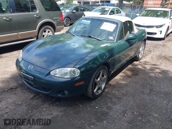 2001 Mazda MX-5 Miata z VIN JM1NB353010212273, wystawiony jako IAAI lot #42472564 z przebiegiem 191 319 mil mil oraz . Historia ofert i sprzedaży dostępna na DreamBid. Obrazek 2.