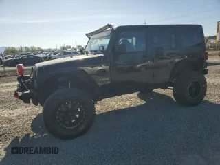 2014 Jeep Wrangler Unlimited Sport with VIN 1C4BJWDG1EL308834, listed as a Copart auction lot 53710065 with 127,612 mi miles and Clean Title. Bid and sale history available at DreamBid. Image 1.