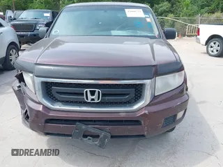 2009 Honda Ridgeline RT with VIN 5FPYK16239B109716, listed as a IAAI auction lot 42068772 with 206,649 mi miles. Bid and sale history available at carsss.com. Image 12.
