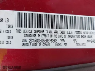 2014 Dodge Grand Caravan SE with VIN 2C4RDGBG5ER376866, listed as a IAAI auction lot 42022978 with 108,037 mi miles. Bid and sale history available at carsss.com. Image 9.