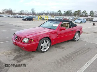 1997 Mercedes-Benz SL-Class with VIN WDBFA67F2VF142244, listed as a IAAI auction lot 41823242 with Not Provided miles. Bid and sale history available at carsss.com. Image 2.
