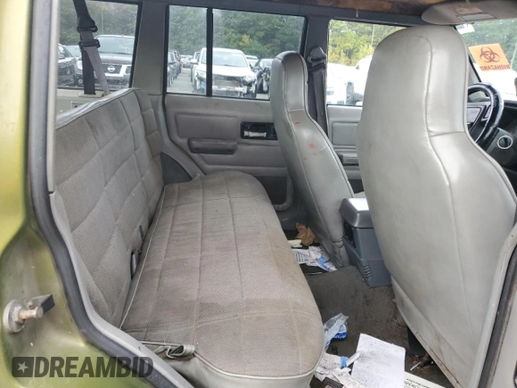 1996 Jeep Cherokee Sport with VIN 1J4FJ68S9TL291661, listed as a Copart auction lot 71968934 with 139,695 mi miles and Salvage Title. Bid and sale history available at carsss.com. Image 11.