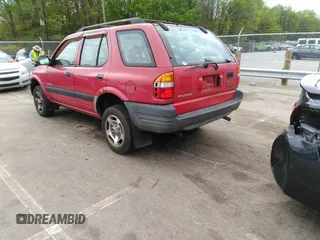 1998 Isuzu Rodeo S z VIN 4S2CK58WXW4325645, wystawiony jako IAAI lot #42013228 z przebiegiem 300 698 mil mil oraz . Historia ofert i sprzedaży dostępna na DreamBid. Obrazek 3.