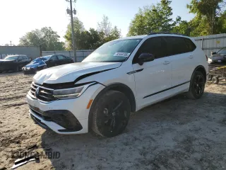 2023 Volkswagen Tiguan SE R-Line Black z VIN 3VVCB7AX6PM012271, wystawiony jako Copart lot #54506175 z przebiegiem 28 168 mil mil oraz Szkoda całkowita • Salvage title. Historia ofert i sprzedaży dostępna na DreamBid. Obrazek 1.
