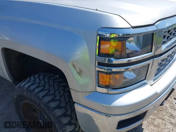 2014 Chevrolet Silverado 1500 LT with VIN 3GCUKREH0EG399090, listed as a IAAI auction lot 42142324 with 104,226 mi miles and . Bid and sale history available at DreamBid. Image 6.