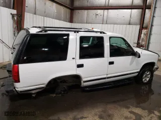 1999 Chevrolet Tahoe Z71 with VIN 1GNEK13R4XJ356365, listed as a Copart auction lot 49849285 with 187,701 mi miles and Salvage Title. Bid and sale history available at carsss.com. Image 3.