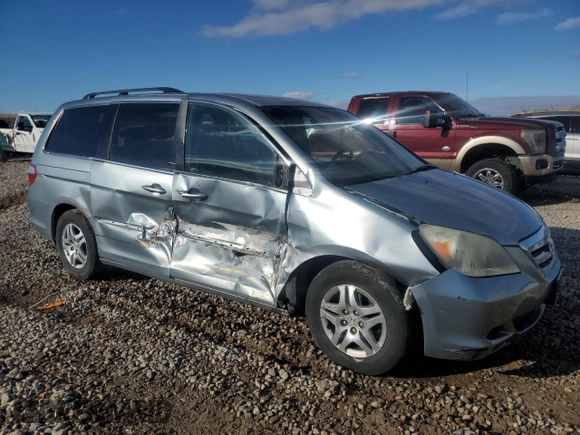 2007 Honda Odyssey EX-L with VIN 5FNRL38647B023186, listed as a Copart auction lot 87697035 with 190,884 mi miles and Salvage Title. Bid and sale history available at carsss.com. Image 4.
