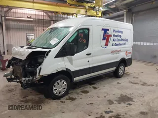 2021 Ford Transit Cargo with VIN 1FTBR1C82MKA29712, listed as a IAAI auction lot 41463781 with 83,961 mi miles and . Bid and sale history available at DreamBid. Image 18.