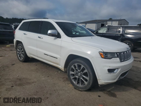 2018 Jeep Grand Cherokee High Altitude with VIN 1C4RJECG2JC442627, listed as a Copart auction lot 61041495 with 88,115 mi miles and Salvage title. Bid and sale history available at DreamBid. Image 4.