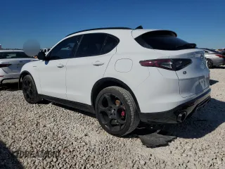 2024 Alfa Romeo Stelvio Ti z VIN ZASPAKBN3R7D71620, wystawiony jako Copart lot #80831844 z przebiegiem 6 354 mil mil oraz Szkoda całkowita • Salvage title. Historia ofert i sprzedaży dostępna na DreamBid. Obrazek 2.