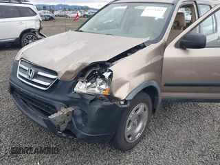 2006 Honda CR-V LX with VIN JHLRD78586C005185, listed as a IAAI auction lot 41976444 with 175,357 mi miles and . Bid and sale history available at carsss.com. Image 6.