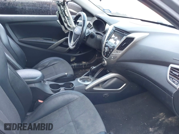 2013 Hyundai Veloster w/Black Int with VIN KMHTC6AD2DU158889, listed as a IAAI auction lot 41878065 with 157,450 mi miles and . Bid and sale history available at DreamBid. Image 5.