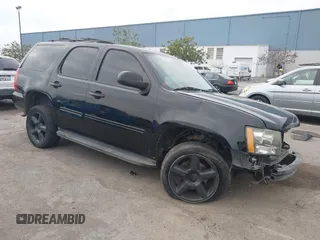 2013 Chevrolet Tahoe LT with VIN 1GNSKBE05DR152825, listed as a IAAI auction lot 41450863 with 157,305 mi miles and . Bid and sale history available at DreamBid. Image 1.