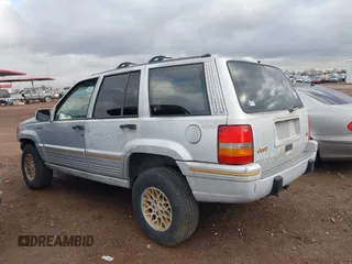1995 Jeep Grand Cherokee Limited with VIN 1J4GZ78Y3SC649231, listed as a IAAI auction lot 41763953 with 140,889 mi miles. Bid and sale history available at carsss.com. Image 3.
