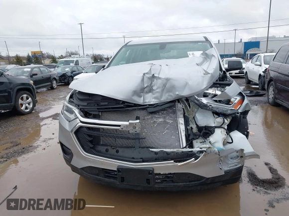 2020 Chevrolet Traverse LS with VIN 1GNEVFKW3LJ302044, listed as a IAAI auction lot 41211456 with 49,666 mi miles and . Bid and sale history available at DreamBid. Image 12.