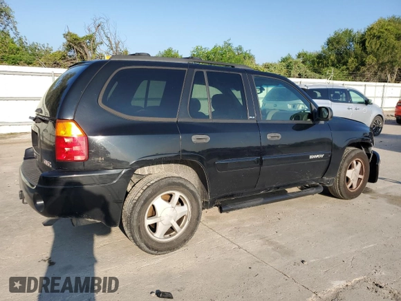 2003 GMC Envoy SLE with VIN 1GKDS13S232329083, listed as a Copart auction lot 73147534 with 212,645 mi miles and Salvage Title. Bid and sale history available at DreamBid. Image 3.