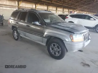 2000 Jeep Grand Cherokee Laredo with VIN 1J4GW48S0YC253091, listed as a Copart auction lot 60357255 with 218,410 mi miles and Clean title. Bid and sale history available at DreamBid. Image 4.