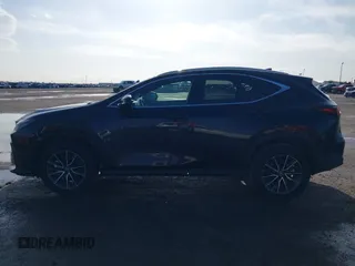2023 Lexus NX 350h with VIN 2T2AKCEZ4PC010808, listed as a IAAI auction lot 41073898 with 30,815 mi miles and . Bid and sale history available at DreamBid. Image 14.