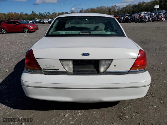 2000 Ford Crown Victoria LX with VIN 2FAFP74W0YX125595, listed as a Copart auction lot 84675434 with 151,438 mi miles and Salvage Title. Bid and sale history available at carsss.com. Image 6.