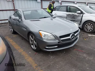 2012 Mercedes-Benz SLK-Class SLK 350 with VIN WDDPK5HA1CF007243, listed as a IAAI auction lot 41313121 with 137,538 mi miles. Bid and sale history available at carsss.com. Image 1.