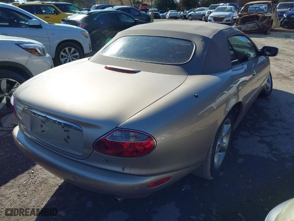 2001 Jaguar XK8 with VIN SAJDA42C21NA20482, listed as a IAAI auction lot 41322790 with NaN miles. Bid and sale history available at carsss.com. Image 4.
