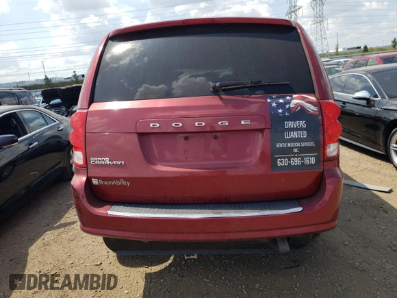 2015 Dodge Grand Caravan SE with VIN 2C4RDGBG2FR613184, listed as a Copart auction lot 67111284 with 249,959 mi miles and Salvage Title. Bid and sale history available at DreamBid. Image 6.