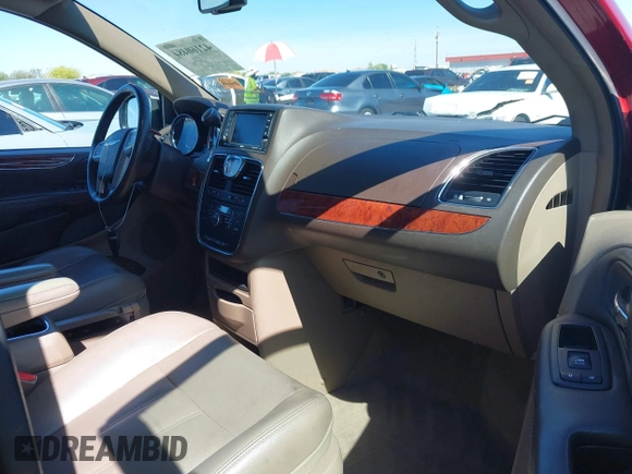2014 Chrysler Town & Country Touring with VIN 2C4RC1BG9ER326259, listed as a IAAI auction lot 42160484 with 151,896 mi miles and . Bid and sale history available at DreamBid. Image 5.