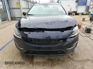 2016 Volvo S60 T5 Drive-E Premier z VIN YV126MFK5G2412365, wystawiony jako Copart lot #51577155 z przebiegiem 59 319 mil mil oraz Szkoda całkowita • Salvage title. Historia ofert i sprzedaży dostępna na DreamBid. Obrazek 5.