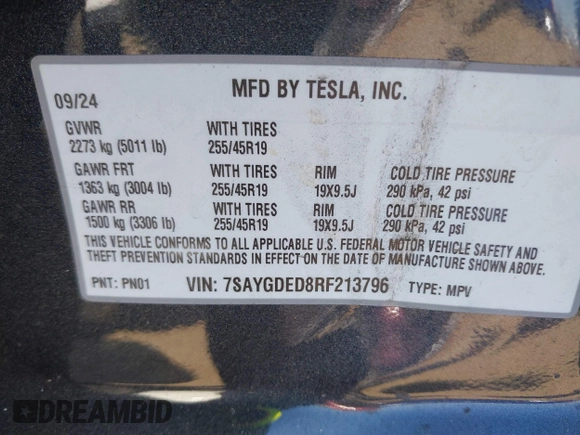 2024 Tesla Model Y with VIN 7SAYGDED8RF213796, listed as a IAAI auction lot 41634130 with 7,710 mi miles and . Bid and sale history available at DreamBid. Image 9.
