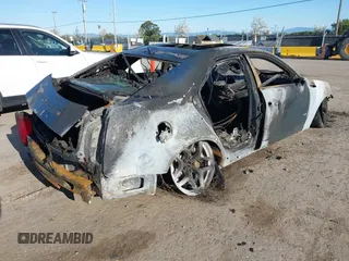 2009 Cadillac CTS-V z VIN 1G6DN57PX90104417, wystawiony jako IAAI lot #41939094 z przebiegiem Nie podano mil oraz . Historia ofert i sprzedaży dostępna na DreamBid. Obrazek 4.