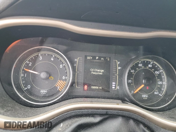 2015 Jeep Cherokee Sport with VIN 1C4PJLAB7FW517637, listed as a Copart auction lot 61385945 with 158,956 mi miles and Salvage title. Bid and sale history available at DreamBid. Image 9.