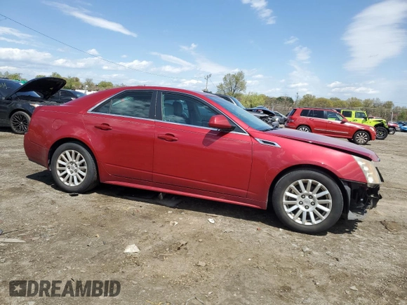 2011 Cadillac CTS with VIN 1G6DA5EY1B0160856, listed as a Copart auction lot 52859315 with 86,787 mi miles and Salvage Title. Bid and sale history available at DreamBid. Image 4.