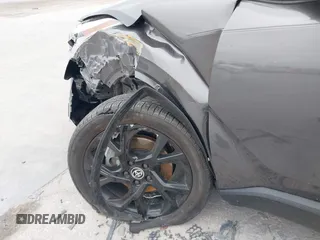 2021 Toyota C-HR LE with VIN JTNKHMBX3M1120177, listed as a IAAI auction lot 41257866 with 43,964 mi miles. Bid and sale history available at carsss.com. Image 6.