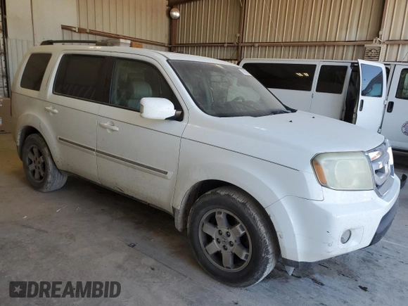 2010 Honda Pilot Touring with VIN 5FNYF3H8XAB019977, listed as a Copart auction lot 75955974 with 136,873 mi miles and Salvage Title. Bid and sale history available at DreamBid. Image 4.