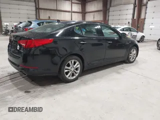 2013 Kia Optima EX with VIN 5XXGN4A73DG254485, listed as a IAAI auction lot 42097254 with 157,053 mi miles. Bid and sale history available at carsss.com. Image 4.