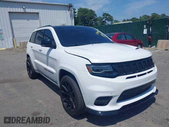 2019 Jeep Grand Cherokee Summit with VIN 1C4RJFJT1KC785744, listed as a IAAI auction lot 42645006 with 38,483 mi miles and . Bid and sale history available at DreamBid. Image 1.