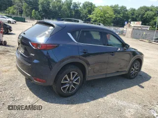 2018 Mazda CX-5 Grand Touring with VIN JM3KFBDM8J0342272, listed as a Copart auction lot 61930115 with 119,727 mi miles and Salvage title. Bid and sale history available at DreamBid. Image 3.